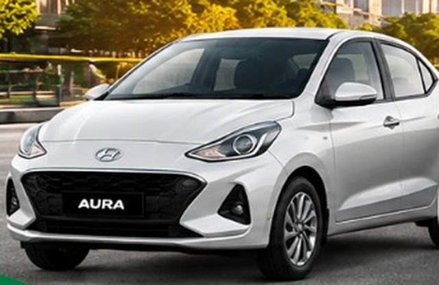 White Hyundai Aura