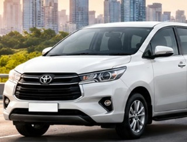 White Toyota Innova Crysta
